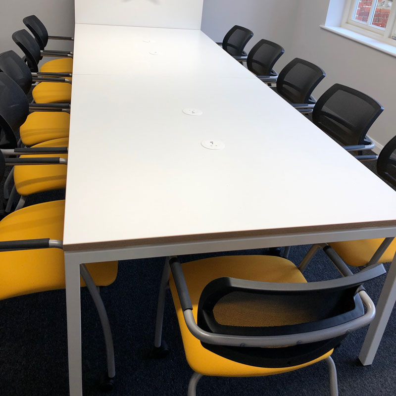 Zest office media wall meeting table with chairs