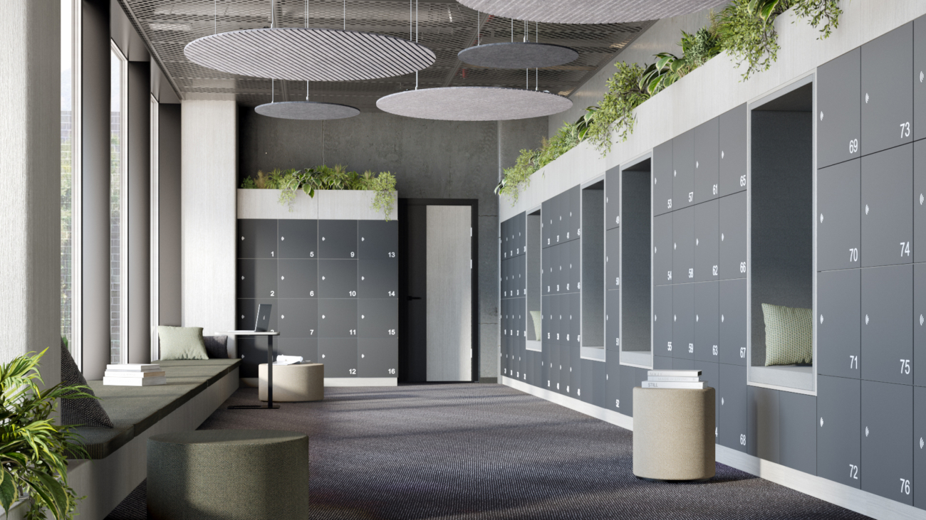 Large room filled with grey lockers with planters on top, and acoustic panels hanging from the ceiling.