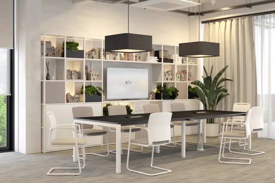 A modern, professional office space showcasing office furniture from the Elite Matrix range, including boardroom table, chairs and metal storage units.