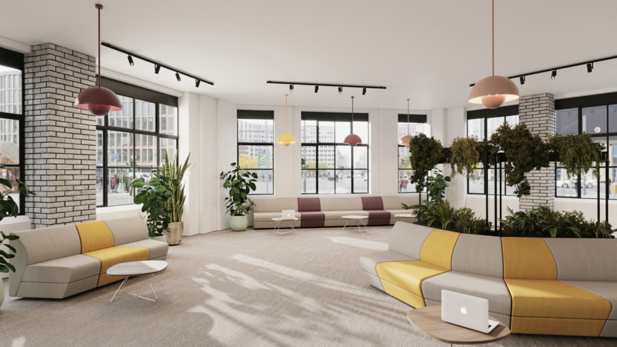 Large room with grey and yellow sofa.