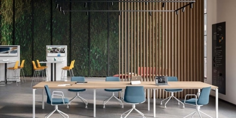 QG Clue meeting chair with a sleek upholstered seat and modern black metal frame.