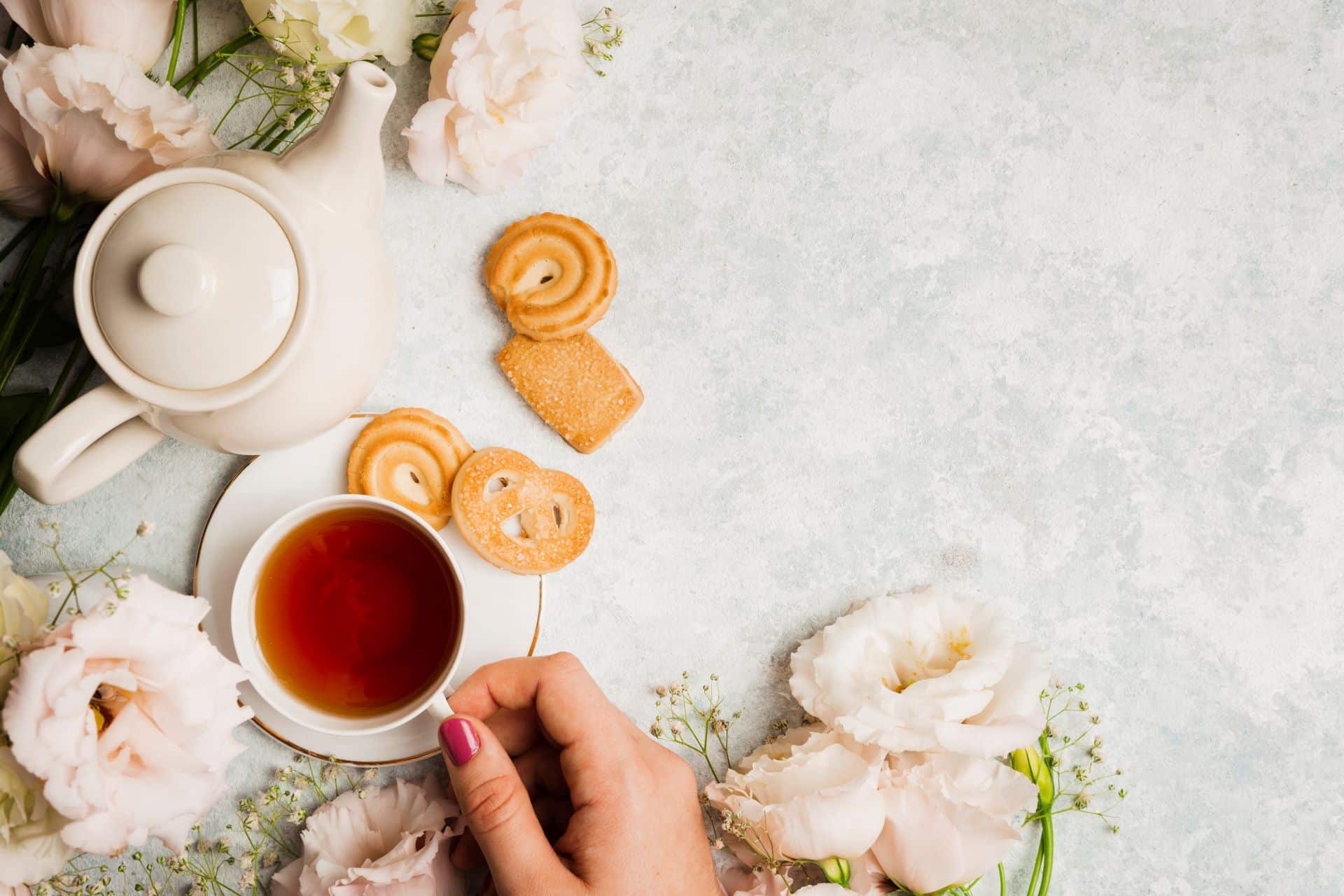 English tea placed on a table with biscuits.