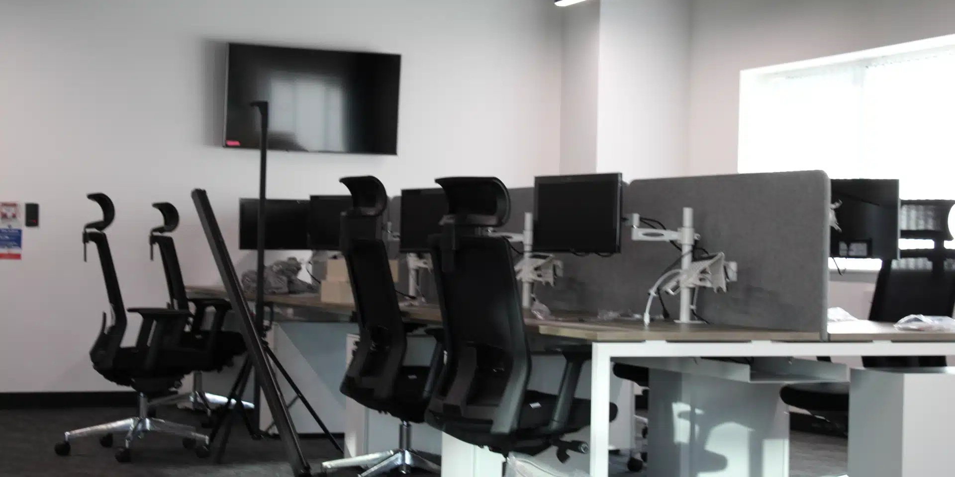 An office room with office chairs.