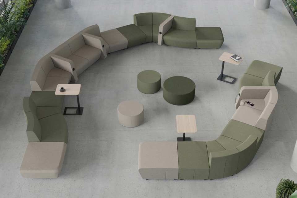 A modular sofa placed in an open space is used as a resting space.