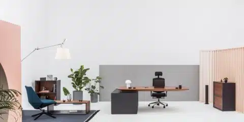 A large room with executive desk and chair.