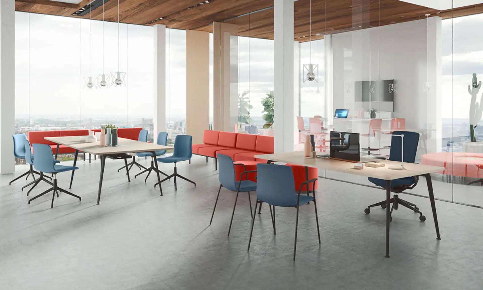 A large room filled with modern desks and office chairs.