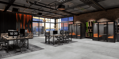 A large container placed in an industrial office space.