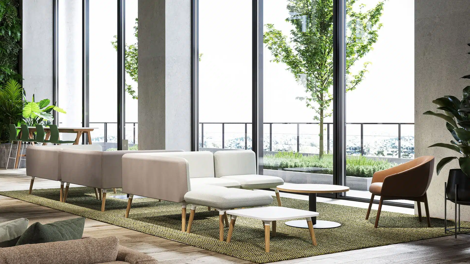 A white modular sofa that is in a large spacious and light room.