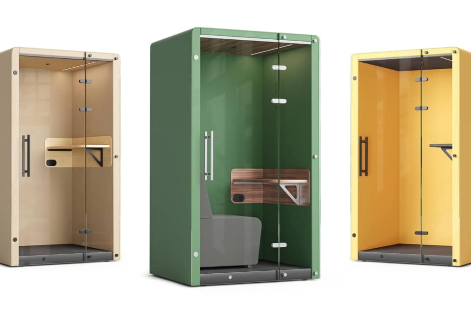 Three yellow, green, and beige booths standing side-by-side.