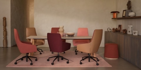 Pastel coloured boardroom chairs.