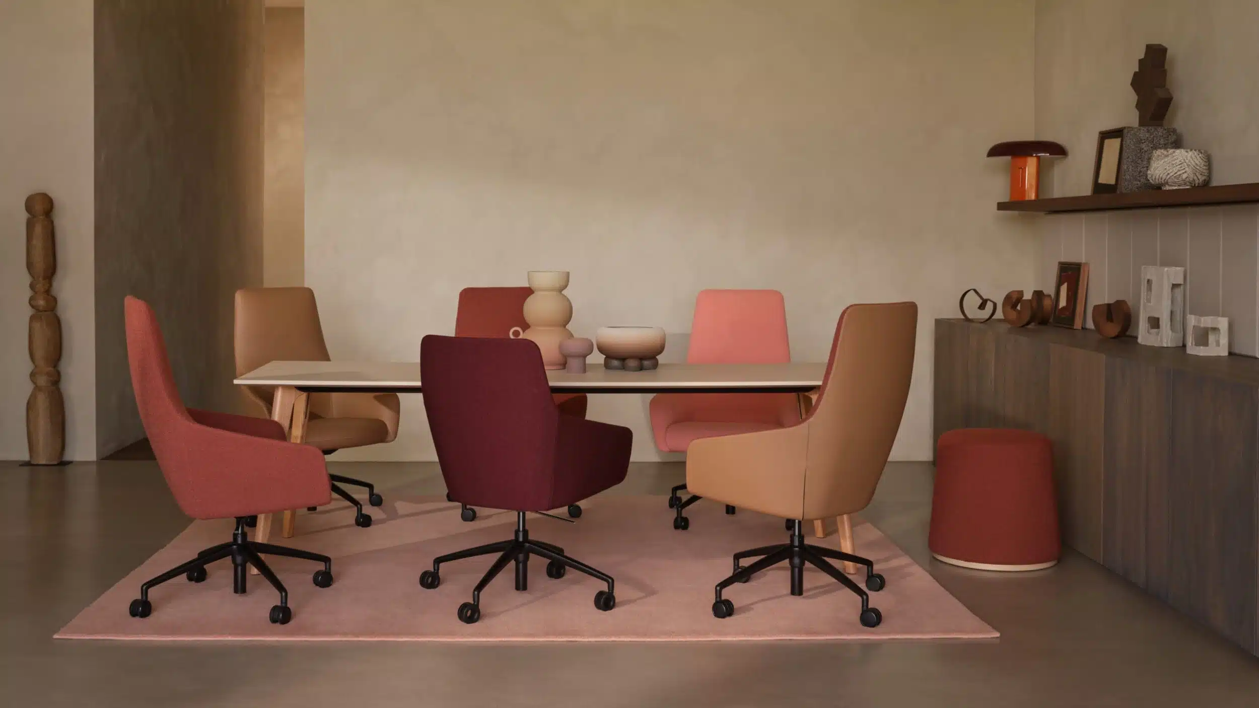 Pastel coloured boardroom chairs.