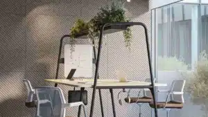 Narbutas ROUND Multipurpose Table in a modern office, showing its versatility as a high collaborative meeting table and individual workstation.