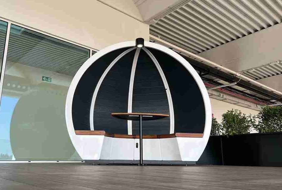 White Outdoor Orb pods blend perfectly with modern architecture.
