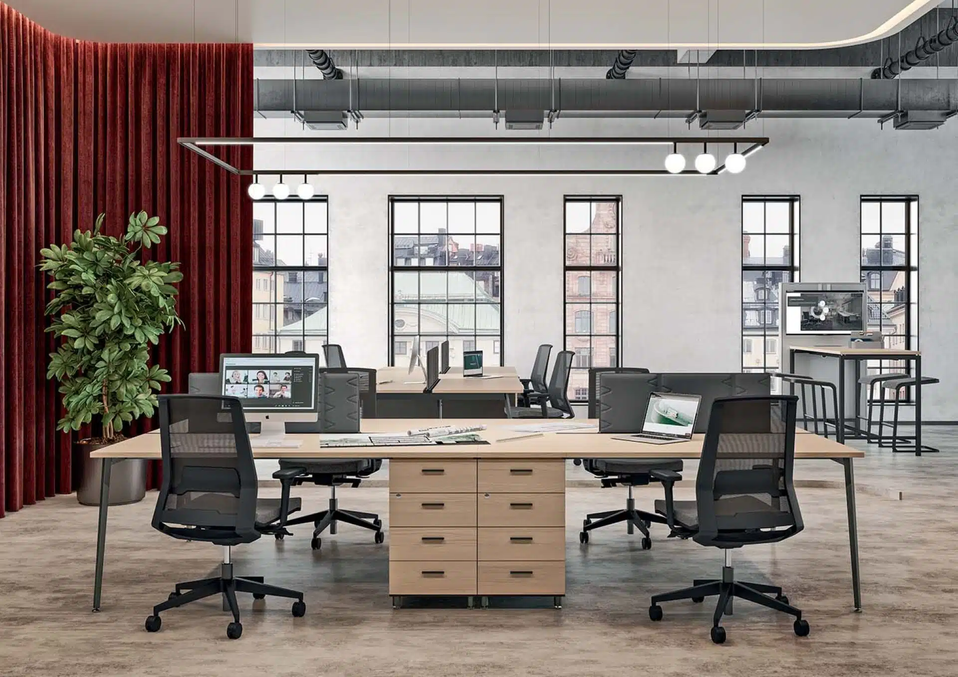 Open-plan office featuring two X3 bench desks with light wood tops.