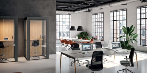 This modern, versatile desk features a light, clean design with conical legs.
