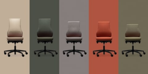 Five RH Axia ergonomic chairs in beige, dark green, grey, orange, and olive green, each set against a matching color-block background.