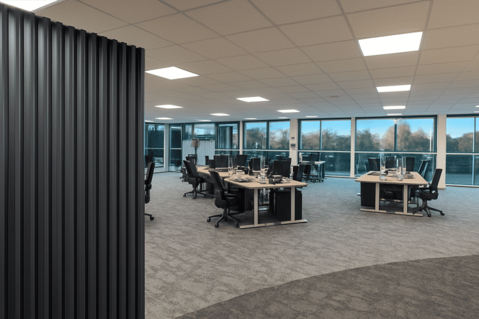 Close-up of an Imperial electric sit-stand desk and a Tick ergonomic office chair at the refurbished MSC Ipswich workspace.