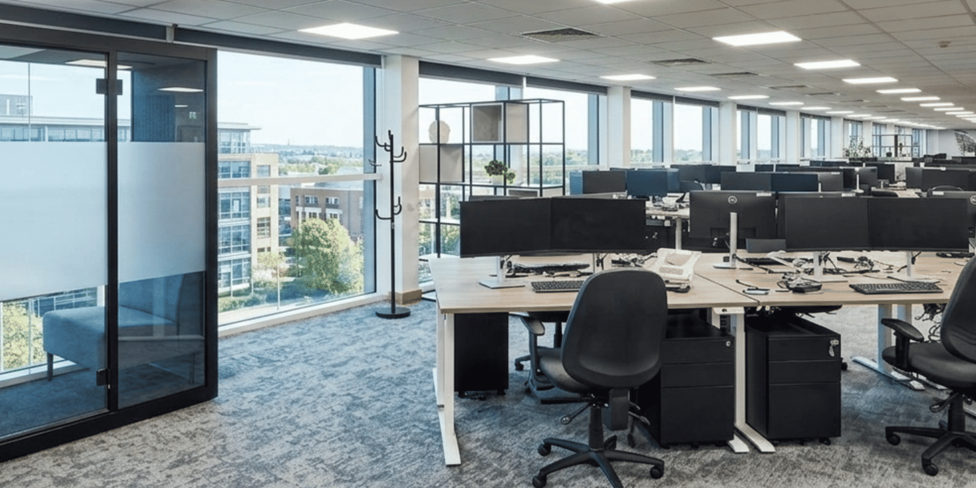 Spacious open-plan corporate workspace at MSC Ipswich equipped with an acoustic meeting pod and Imperial sit-stand desks.